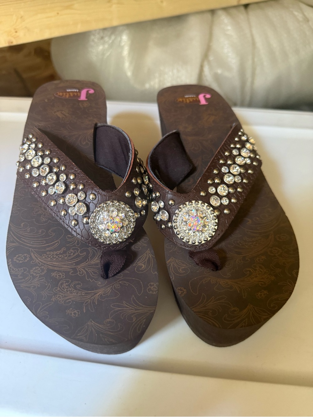 Embellished Brown Wedge Thong Sandals with Sparkling Medallions